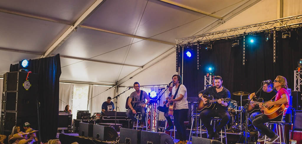 Photo of a concert in a marquee