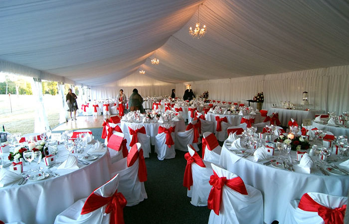 Red and white theme with chair sashes in red